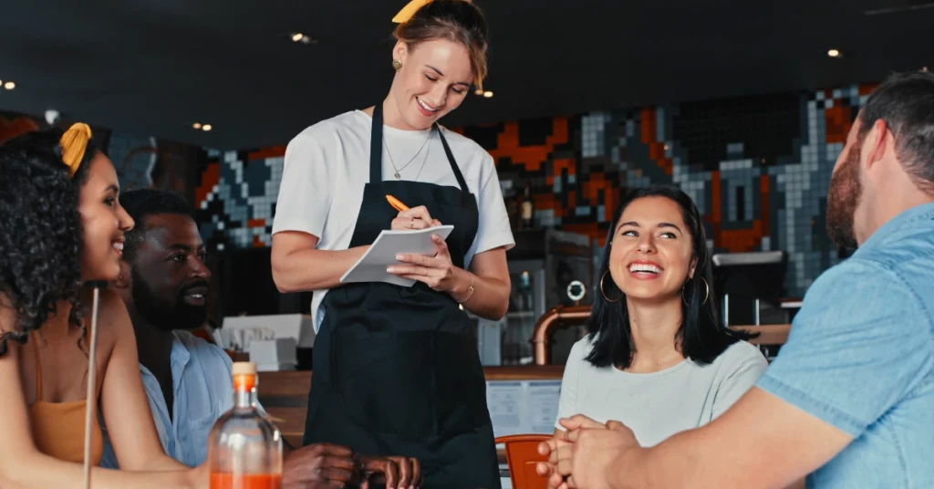Group of people ordering in a restaurant